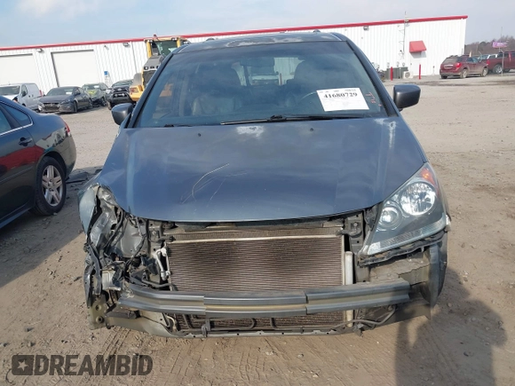 2010 Honda Odyssey EX-L with VIN 5FNRL3H7XAB099821, listed as a IAAI auction lot 41680729 with 217,458 mi miles and . Bid and sale history available at DreamBid. Image 12.