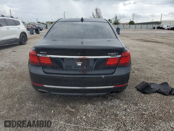 2013 BMW 7 Series 750i xDrive z VIN WBAYB6C53DC997908, wystawiony jako Copart lot #74759314 z przebiegiem Nie podano mil oraz Szkoda całkowita • Salvage title. Historia ofert i sprzedaży dostępna na DreamBid. Obrazek 6.