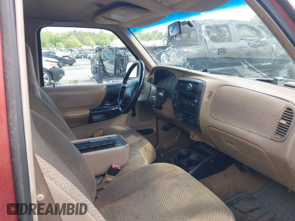 1999 Ford Ranger with VIN 1FTZR11XXXPB07153, listed as a IAAI auction lot 42189106 with 239,606 mi miles and . Bid and sale history available at DreamBid. Image 5.