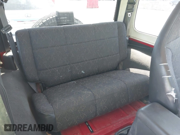 2001 Jeep Wrangler Sport with VIN 1J4FA49S11P375854, listed as a IAAI auction lot 42334037 with 215,027 mi miles and . Bid and sale history available at DreamBid. Image 8.