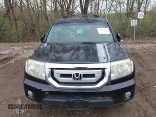 2009 Honda Pilot Touring with VIN 5FNYF48959B016978, listed as a IAAI auction lot 41947782 with 234,115 mi miles and . Bid and sale history available at carsss.com. Image 17.