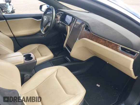 2016 Tesla Model S 70 with VIN 5YJSA1E18GF174200, listed as a IAAI auction lot 42274415 with 65,231 mi miles and . Bid and sale history available at DreamBid. Image 5.