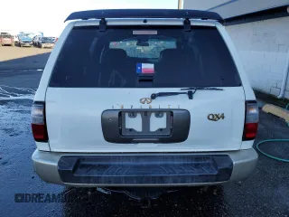 2000 Infiniti QX4 z VIN JNRAR07Y3YW084474, wystawiony jako Copart lot #87089994 z przebiegiem 237 974 mil mil oraz Szkody całkowita. Historia ofert i sprzedaży dostępna na DreamBid. Obrazek 6.