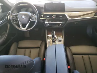 2020 BMW 5 Series 530e with VIN WBAJA9C01LCD69759, listed as a Copart auction lot 58271025 with 56,732 mi miles and Salvage title. Bid and sale history available at DreamBid. Image 8.