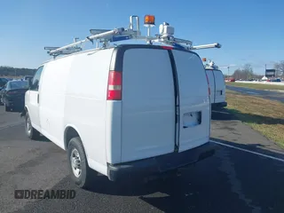 2015 Chevrolet Express Cargo with VIN 1GCWGFCF1F1161498, listed as a IAAI auction lot 41878871 with 157,365 mi miles. Bid and sale history available at carsss.com. Image 3.