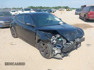 2013 Hyundai Veloster w/Black Int with VIN KMHTC6AD8DU135360, listed as a IAAI auction lot 39632653 with 135,744 mi miles and . Bid and sale history available at DreamBid. Image 1.