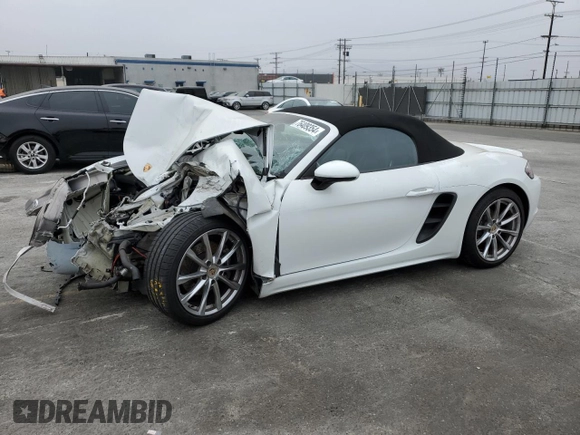 2019 Porsche 718 Boxster z VIN WP0CA2A80KS211040, wystawiony jako Copart lot #76409354 z przebiegiem 27 669 mil mil oraz Szkoda całkowita • Salvage title. Historia ofert i sprzedaży dostępna na DreamBid. Obrazek 1.