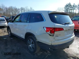 2016 Honda Pilot EX-L with VIN 5FNYF6H50GB073384, listed as a IAAI auction lot 41639667 with 99,267 mi miles. Bid and sale history available at carsss.com. Image 3.