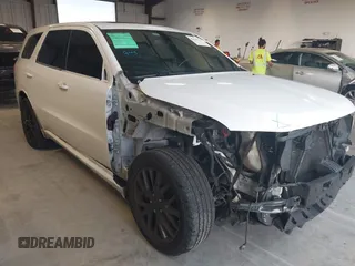 2014 Dodge Durango R/T with VIN 1C4SDHCT6EC975089, listed as a IAAI auction lot 42649733 with 256,019 mi miles and . Bid and sale history available at DreamBid. Image 1.