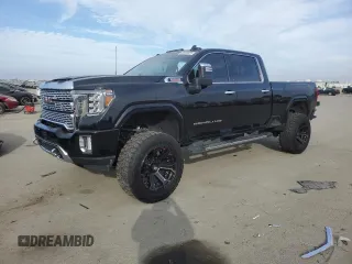 2020 GMC Sierra 3500HD Denali z VIN 1GT49WEY8LF341558, wystawiony jako Copart lot #42609425 z przebiegiem 70 658 mil mil oraz Szkody całkowita. Historia ofert i sprzedaży dostępna na DreamBid. Obrazek 1.