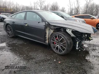 2022 Audi S7 Prestige z VIN WAUSFBF23NN018754, wystawiony jako Copart lot #71702952 z przebiegiem 7408 mil mil oraz . Historia ofert i sprzedaży dostępna na DreamBid. Obrazek 4.