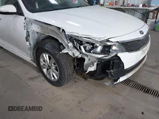 2018 Kia Optima S with VIN 5XXGT4L35JG209737, listed as a IAAI auction lot 41806505 with 98,869 mi miles and . Bid and sale history available at DreamBid. Image 6.