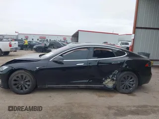2018 Tesla Model S 75D with VIN 5YJSA1E22JF282828, listed as a IAAI auction lot 41595543 with 72,571 mi miles and . Bid and sale history available at DreamBid. Image 13.