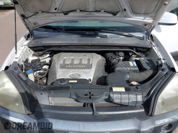 2006 Hyundai Tucson GLS with VIN KM8JN12D06U368350, listed as a IAAI auction lot 41645473 with 127,217 mi miles. Bid and sale history available at carsss.com. Image 10.