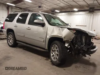 2013 GMC Yukon SLT with VIN 1GKS2CE06DR323343, listed as a IAAI auction lot 41643959 with 246,658 mi miles. Bid and sale history available at carsss.com. Image 1.