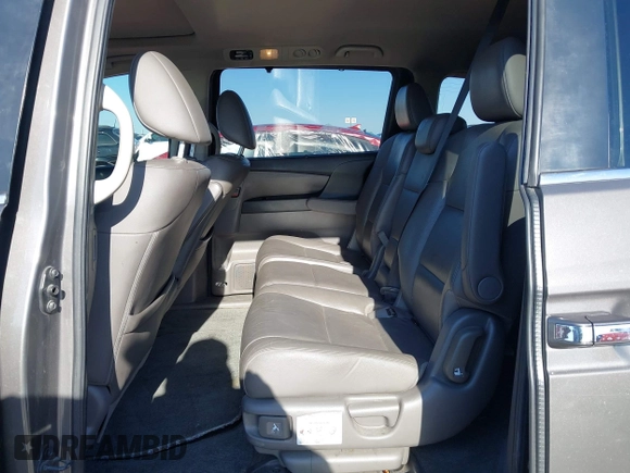 2011 Honda Odyssey EX-L with VIN 5FNRL5H6XBB083980, listed as a IAAI auction lot 42100308 with 191,361 mi miles and . Bid and sale history available at carsss.com. Image 8.