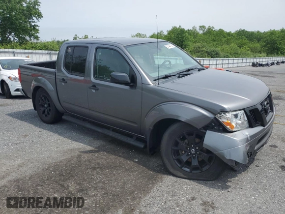 2020 Nissan Frontier SV with VIN 1N6ED0EB2LN723101, listed as a Copart auction lot 57444185 with 74,000 mi miles and Salvage title. Bid and sale history available at DreamBid. Image 4.
