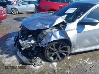 2019 Honda Civic Sport with VIN 2HGFC2F85KH605786, listed as a IAAI auction lot 41621480 with 66,438 mi miles and . Bid and sale history available at DreamBid. Image 20.