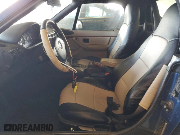 2000 BMW Z3 2.5 with VIN 4USCH9342YLG04259, listed as a Copart auction lot 60921805 with 150,679 mi miles and Salvage title. Bid and sale history available at DreamBid. Image 7.