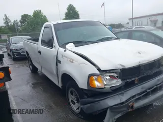 2002 Ford F-150 XL with VIN 1FTRF17242NB86232, listed as a IAAI auction lot 42336859 with 119,321 mi miles and . Bid and sale history available at DreamBid. Image 13.