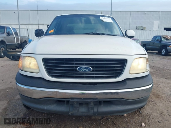 2001 Ford F-150 XLT with VIN 1FTRW07L81KE91672, listed as a IAAI auction lot 42021661 with 200,000 mi miles and . Bid and sale history available at DreamBid. Image 12.
