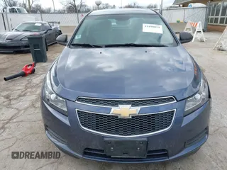 2014 Chevrolet Cruze LS z VIN 1G1PA5SG0E7171051, wystawiony jako IAAI lot #41898051 z przebiegiem 114 087 mil mil oraz . Historia ofert i sprzedaży dostępna na DreamBid. Obrazek 12.