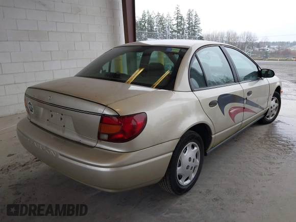 2002 Saturn SL z VIN 1G8ZH52852Z155698, wystawiony jako IAAI lot #41712058 z przebiegiem 90 150 mil mil oraz . Historia ofert i sprzedaży dostępna na DreamBid. Obrazek 4.