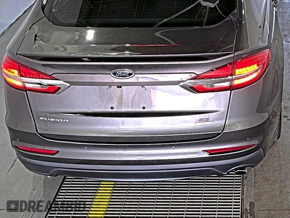 2020 Ford Fusion SE z VIN 3FA6P0HD6LR189762, wystawiony jako IAAI lot #42780149 z przebiegiem 51 099 mil mil oraz . Historia ofert i sprzedaży dostępna na DreamBid. Obrazek 23.