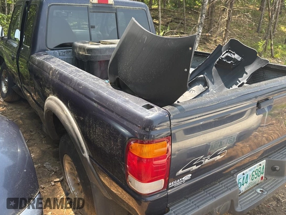 1999 Ford Ranger XL with VIN 1FTZR15V6XTA61496, listed as a Copart auction lot 61017635 with 49,455 mi miles and Clean title. Bid and sale history available at DreamBid. Image 4.