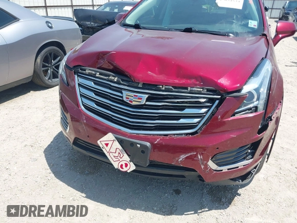 2017 Cadillac XT5 Luxury FWD z VIN 1GYKNBRS4HZ157025, wystawiony jako IAAI lot #42054534 z przebiegiem 78 276 mil mil oraz . Historia ofert i sprzedaży dostępna na DreamBid. Obrazek 6.
