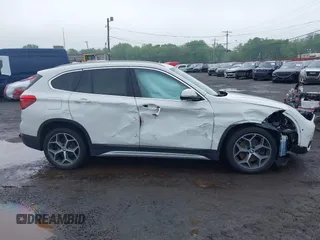 2018 BMW X1 xDrive28i with VIN WBXHT3C38J5L31322, listed as a IAAI auction lot 42260190 with 70,266 mi miles and . Bid and sale history available at DreamBid. Image 13.