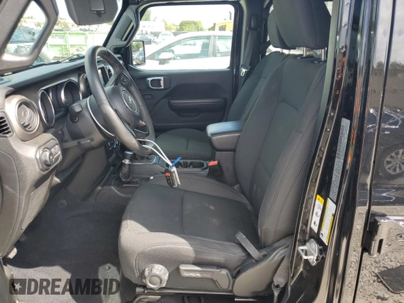 2019 Jeep Wrangler Unlimited Sport S with VIN 1C4HJXDG2KW570078, listed as a Copart auction lot 51119485 with 65,860 mi miles and Salvage title. Bid and sale history available at DreamBid. Image 7.