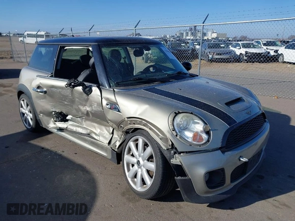 2007 MINI Hardtop S with VIN WMWMF73567TL91385, listed as a IAAI auction lot 41866865 with 114,778 mi miles and . Bid and sale history available at DreamBid. Image 1.