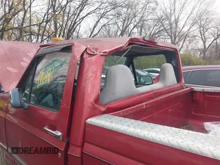 1997 Ford F-250 with VIN 1FTHF26H5VEB81858, listed as a IAAI auction lot 40865874 with 97,807 mi miles. Bid and sale history available at carsss.com. Image 6.