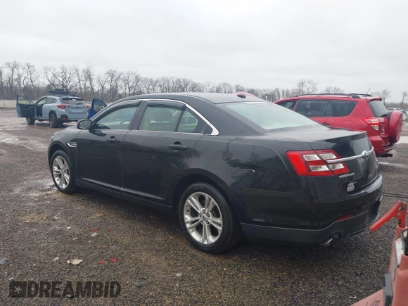 2013 Ford Taurus SEL with VIN 1FAHP2E83DG107913, listed as a IAAI auction lot 42007575 with 147,240 mi miles. Bid and sale history available at carsss.com. Image 3.
