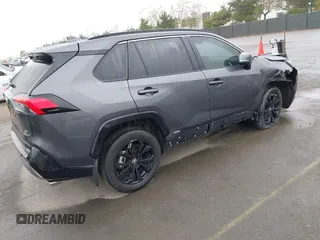 2024 Toyota RAV4 Hybrid SE with VIN 2T3T6RFV0RW055852, listed as a IAAI auction lot 41804088 with 36,428 mi miles and . Bid and sale history available at DreamBid. Image 4.
