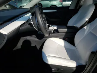 2023 Tesla Model 3 z VIN 5YJ3E1EA0PF646866, wystawiony jako Copart lot #42763275 z przebiegiem 24 382 mil mil oraz Szkoda całkowita • Salvage title. Historia ofert i sprzedaży dostępna na DreamBid. Obrazek 7.
