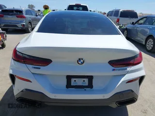 2022 BMW 8 Series M850i z VIN WBAGV8C02NCH87808, wystawiony jako IAAI lot #42255995 z przebiegiem 34 285 mil mil oraz . Historia ofert i sprzedaży dostępna na DreamBid. Obrazek 16.
