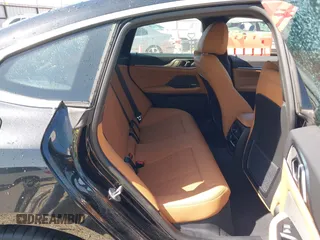 2024 BMW i4 xDrive40 z VIN WBY83FB05RFS37070, wystawiony jako IAAI lot #41975207 z przebiegiem 8 304 mil mil oraz . Historia ofert i sprzedaży dostępna na DreamBid. Obrazek 8.