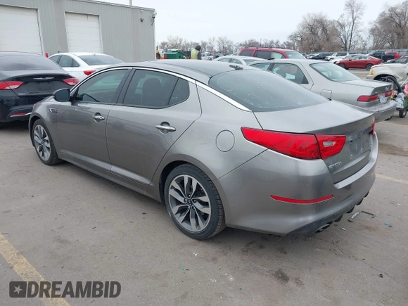 2014 Kia Optima SXL Turbo with VIN 5XXGR4A69EG312273, listed as a IAAI auction lot 41729863 with 107,660 mi miles and . Bid and sale history available at DreamBid. Image 3.