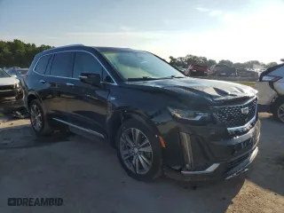 2020 Cadillac XT6 FWD Premium Luxury with VIN 1GYKPCRS3LZ124137, listed as a Copart auction lot 53168233 with 42,228 mi miles and Salvage Title. Bid and sale history available at carsss.com. Image 4.