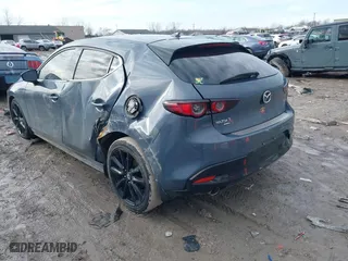 2019 Mazda Mazda3 Hatchback w/Premium Pkg with VIN JM1BPBNM0K1129087, listed as a IAAI auction lot 41684667 with 123,000 mi miles. Bid and sale history available at carsss.com. Image 3.