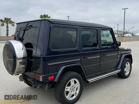 2002 Mercedes-Benz G-Class with VIN WDCYR49E72X133986, listed as a Copart auction lot 54624435 with 138,597 mi miles and Salvage Title. Bid and sale history available at carsss.com. Image 4.