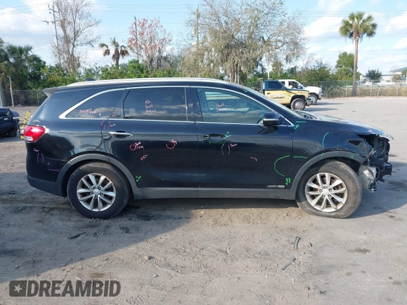 2016 Kia Sorento LX with VIN 5XYPGDA56GG029499, listed as a IAAI auction lot 41512850 with 179,971 mi miles. Bid and sale history available at carsss.com. Image 14.