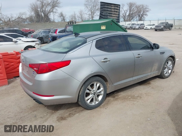 2011 Kia Optima EX with VIN KNAGN4A75B5046848, listed as a IAAI auction lot 41882138 with 81,800 mi miles and . Bid and sale history available at carsss.com. Image 4.