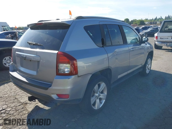 2016 Jeep Compass Sport with VIN 1C4NJCBA5GD574185, listed as a IAAI auction lot 42234955 with 127,468 mi miles and . Bid and sale history available at DreamBid. Image 4.