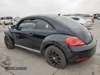 2013 Volkswagen Beetle Entry with VIN 3VWFP7AT8DM630744, listed as a Copart auction lot 51140035 with 118,649 mi miles and Clean Title. Bid and sale history available at DreamBid. Image 2.