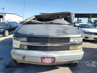 1999 Chevrolet Astro with VIN 1GNDM19W5XB105304, listed as a Copart auction lot 83521934 with 207,384 mi miles and Salvage Title. Bid and sale history available at carsss.com. Image 5.