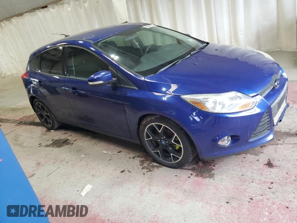 2012 Ford Focus SE z VIN 1FAHP3K23CL412887, wystawiony jako Copart lot #54366635 z przebiegiem 169 788 mil mil oraz Czysty tytuł • Clean title. Historia ofert i sprzedaży dostępna na DreamBid. Obrazek 4.