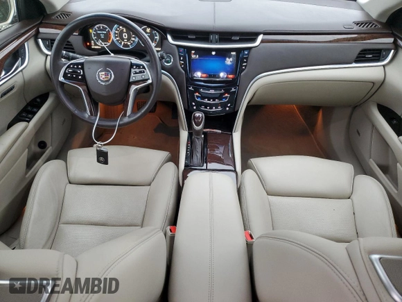 2014 Cadillac XTS Premium with VIN 2G61P5S32E9195930, listed as a Copart auction lot 48320165 with 31,026 mi miles and Salvage Title. Bid and sale history available at DreamBid. Image 8.